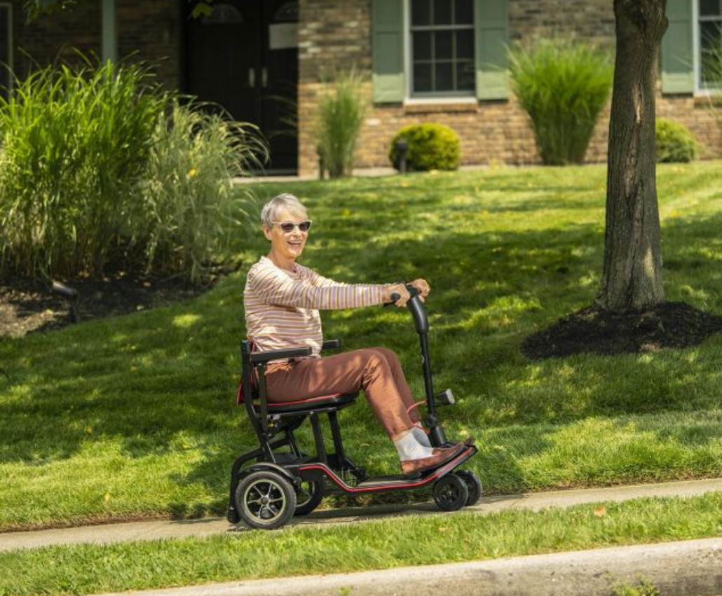 Woman on best lightweight scooter